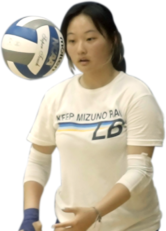 Athlete serving a volleyball
